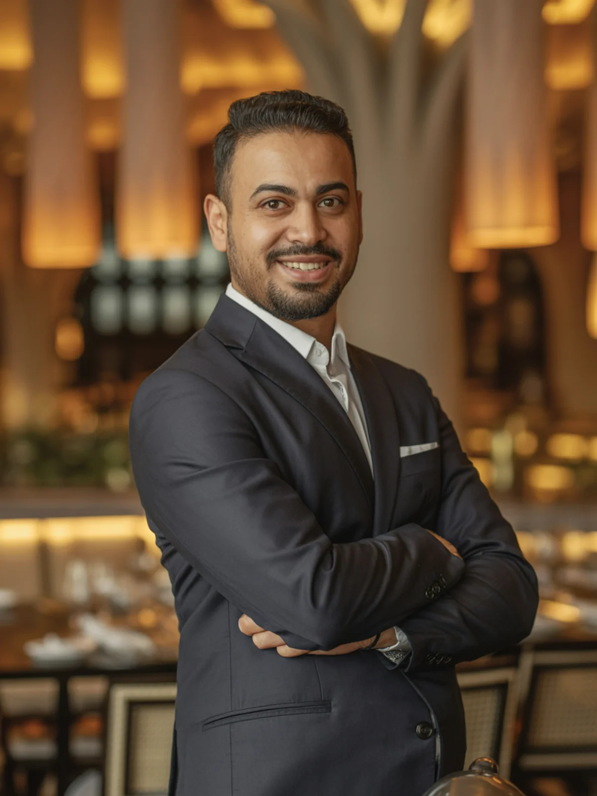 Omar Hassan Team Portrait Omar Hassan, Master Hookah Craftsman at House of Legends