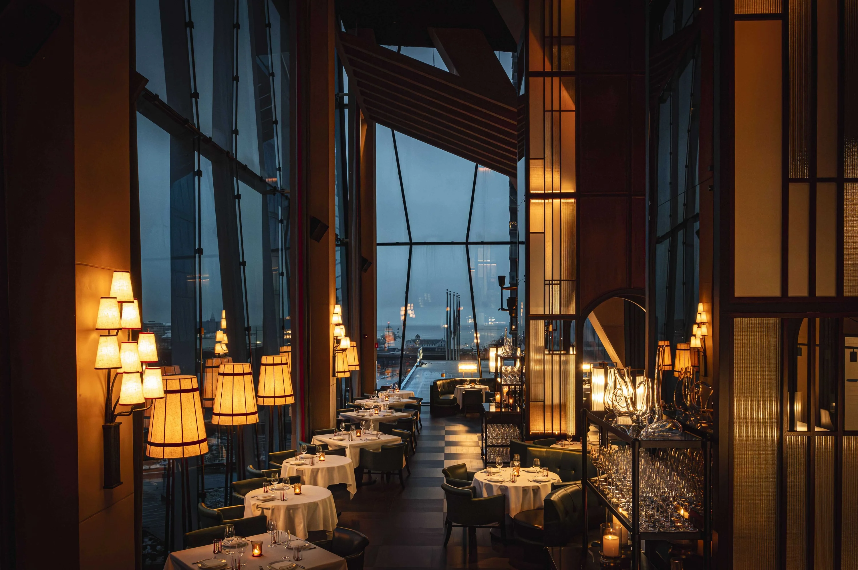 Best Date Night Spots Encino Blog Feature Image Romantic couple enjoying intimate dinner at upscale restaurant with warm ambient lighting and Mediterranean ambiance in Encino